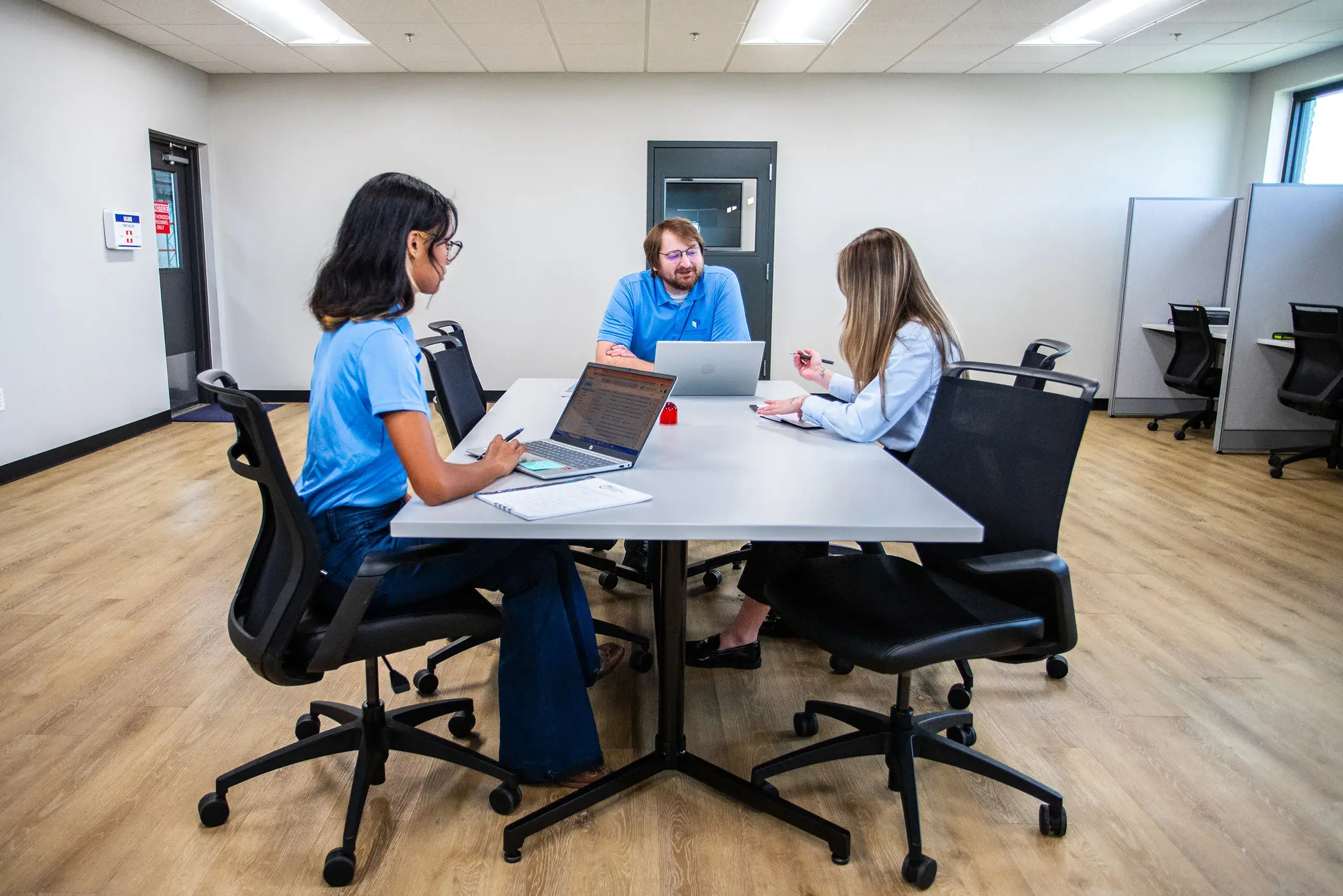 MSA staff collaborating in office space