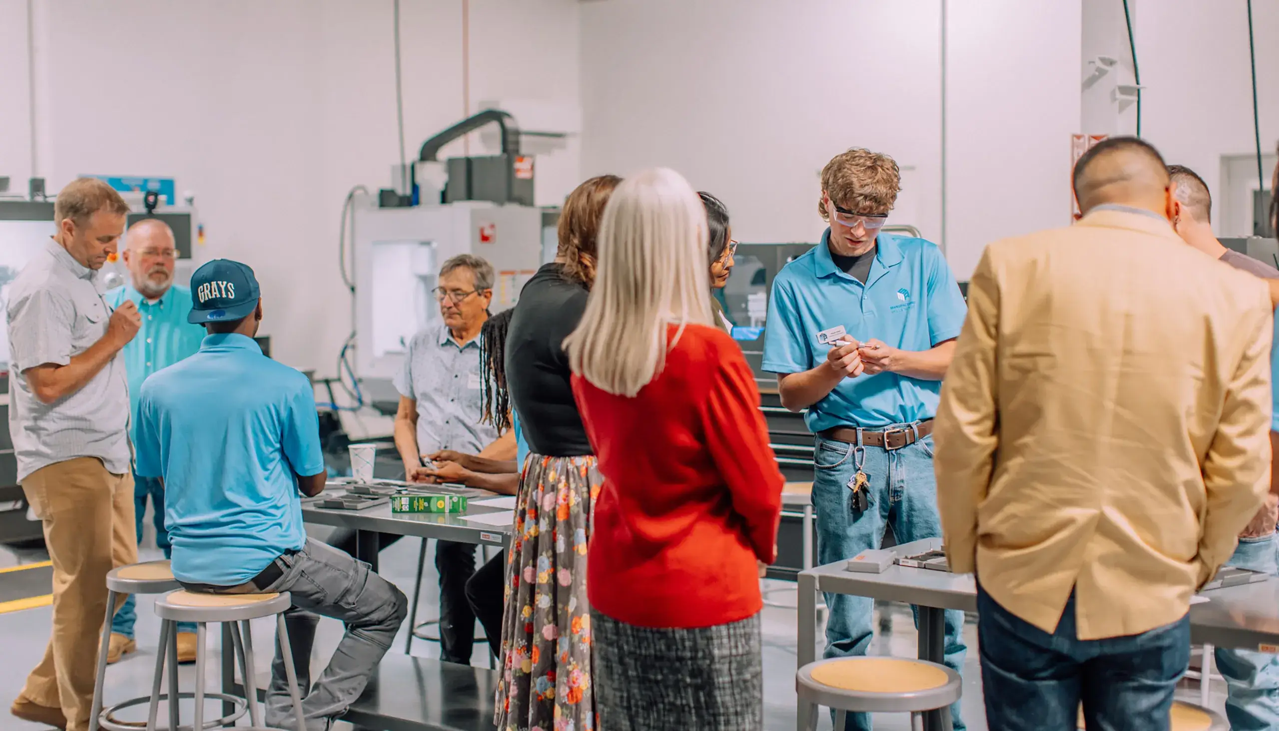 Participants showing work to supporters